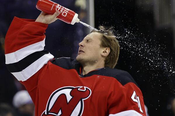 Devils top Oilers tie franchise mark with 13th straight win AP News